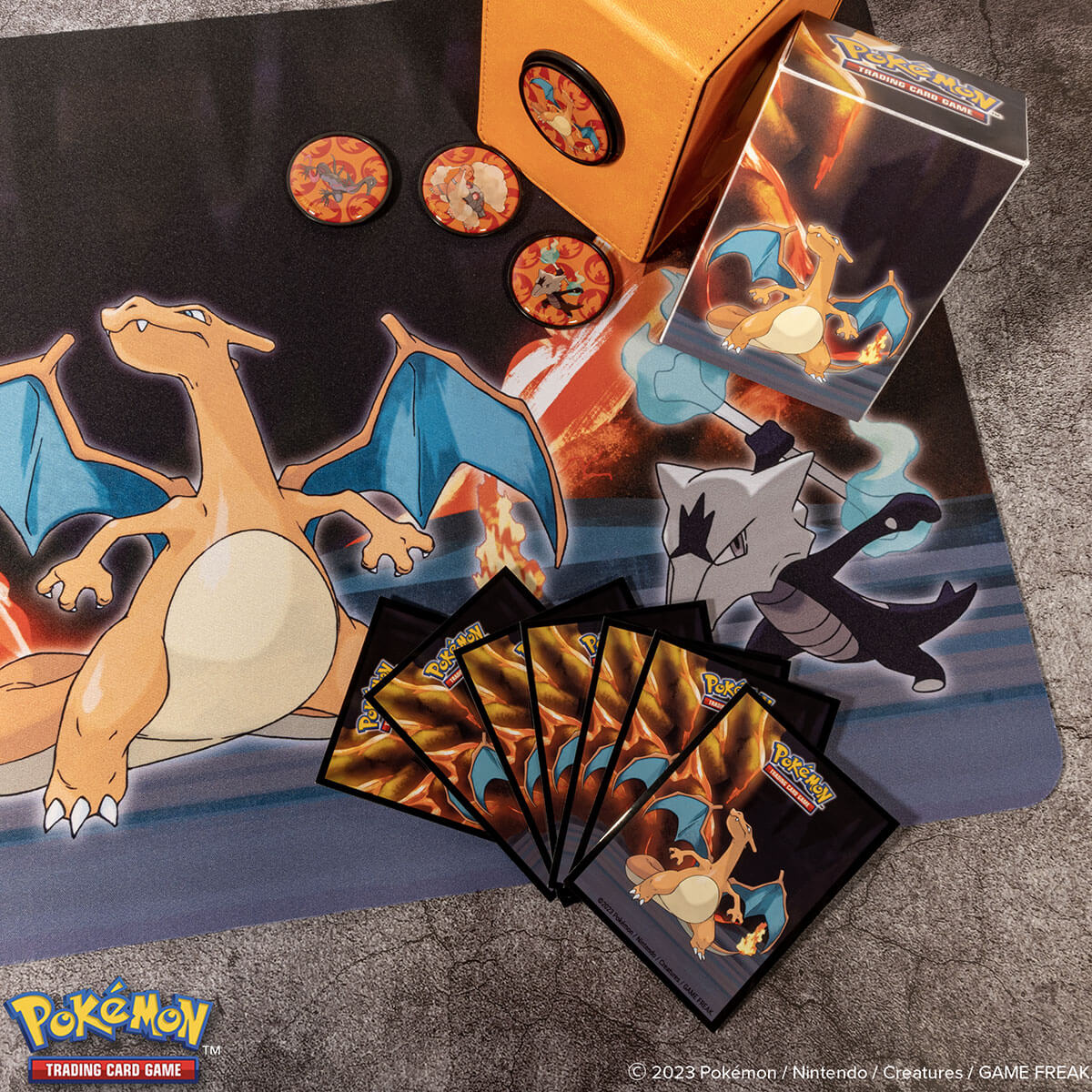 A black and orange Pokemon themed playmat featuring Charizard and Marowak. Brand: Pokemon, Item: Gallery Series Scorching Summit Standard Gaming Playmat Mousepad for Pokemon