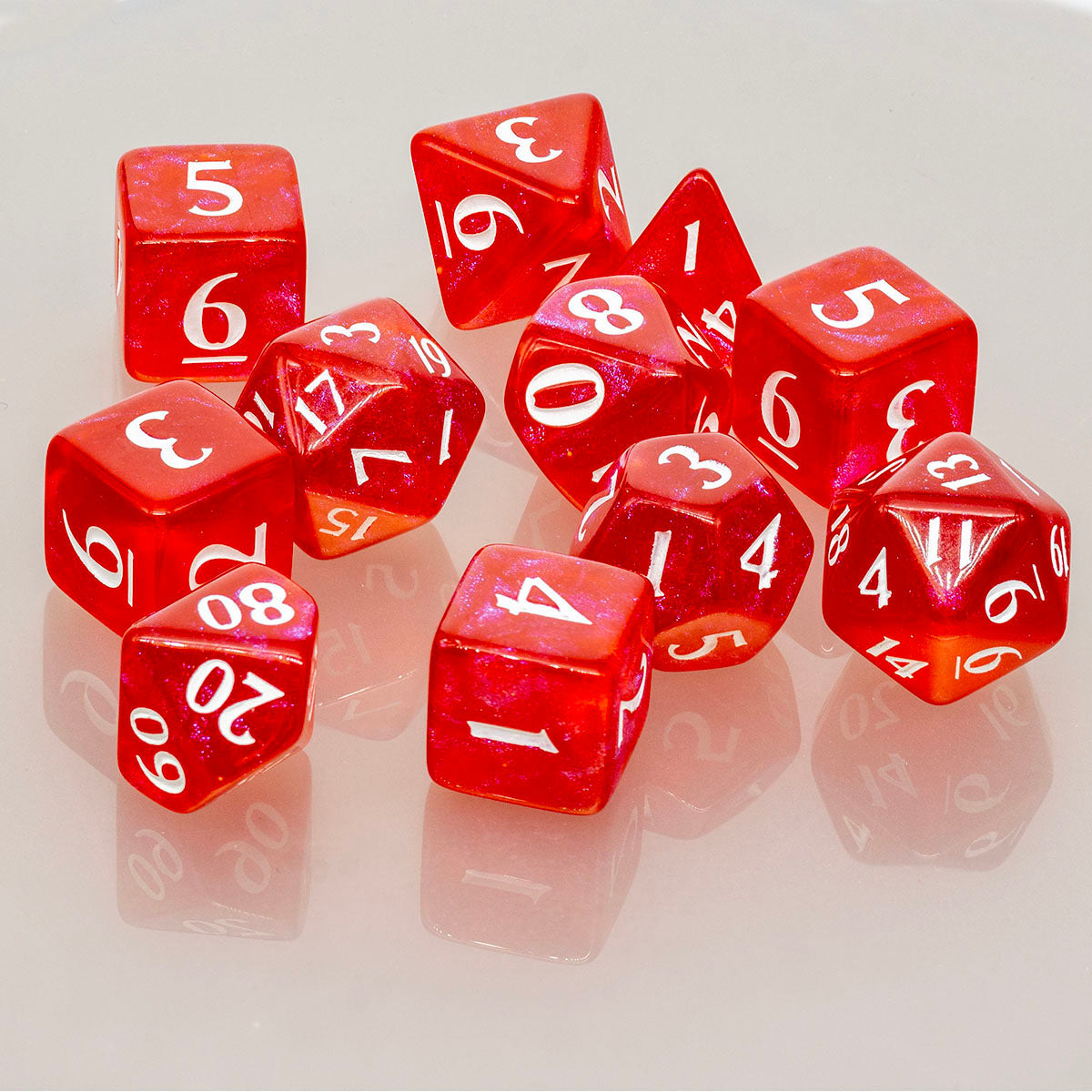 A red acrylic RPG dice set. Brand: Ultra PRO, Item: ECLIPSE® Acrylic RPG Dice Set (11ct) - Apple Red