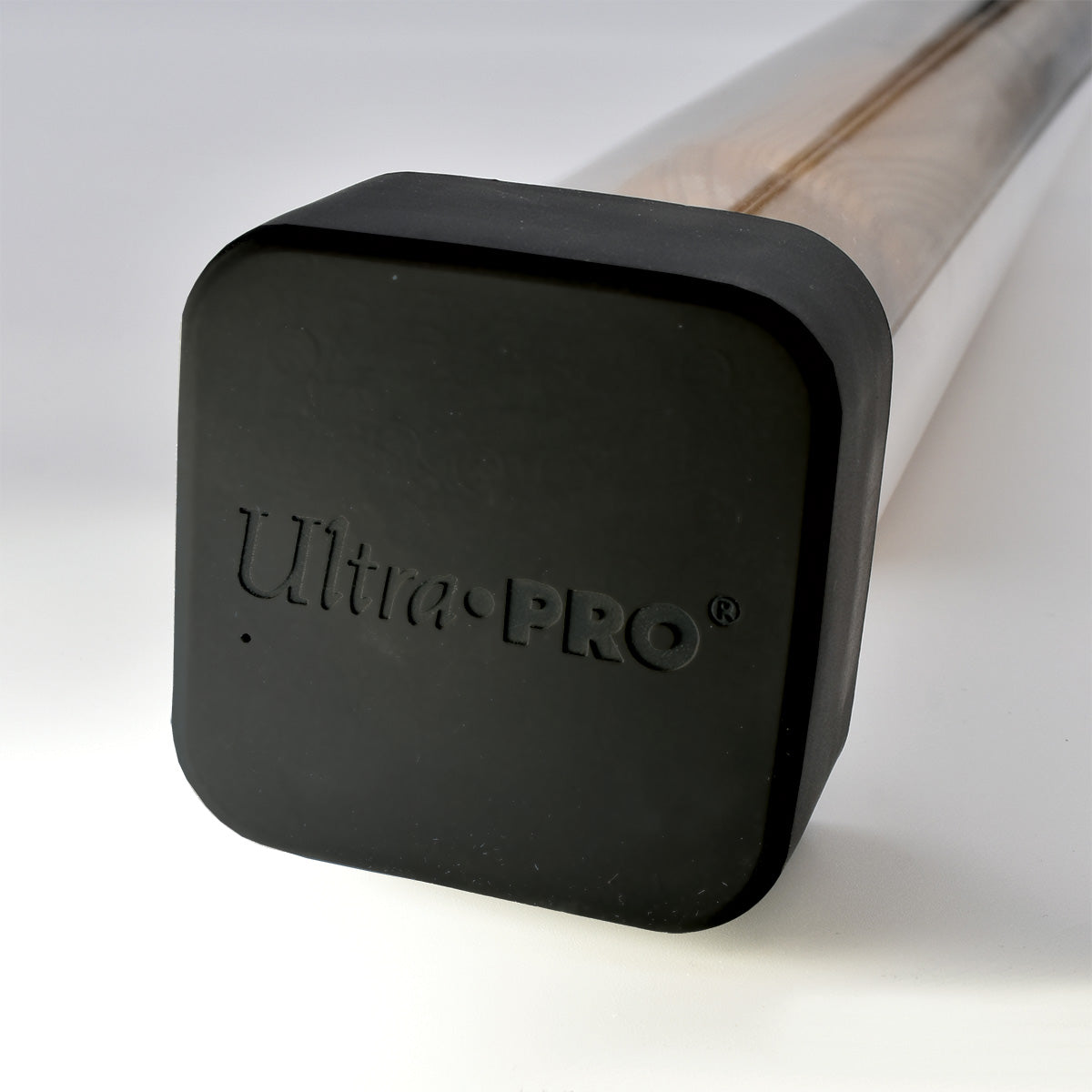 A clear plastic baseball bat tube display with black square end caps. The end cap features the "Ultra-Pro" logo.