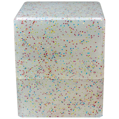 A clear glittery cube deck box. Brand: Ultra PRO, Item: Glitter SATIN® Cube - Crystal