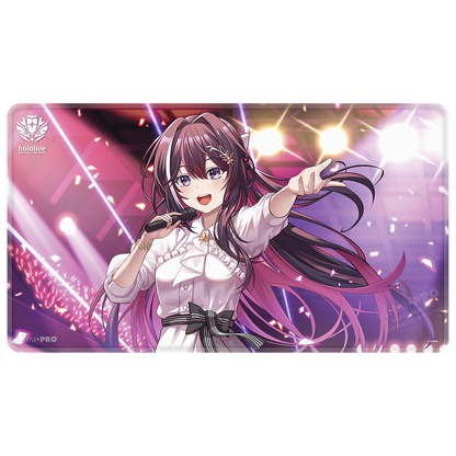 A white and pink anime-style playmat featuring AZKi singing into a microphone on a stage. Brand: Ultra PRO, Item: AZKi Stitched Playmat for the hololive OFFICIAL CARD GAME