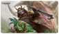 A Magic: The Gathering Ikoria: Lair of Behemoths Easy Prey Standard Gaming Playmat by Ultra PRO.