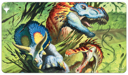 A vibrant green gaming playmat featuring three dinosaurs: a blue-feathered Tyrannosaurus Rex, a Triceratops, and a smaller, red-feathered raptor, in a lush jungle setting. Brand: Ultra PRO, Item: Commander Masters Finale of Devastation Green Standard Gaming Playmat for Magic: The Gathering.