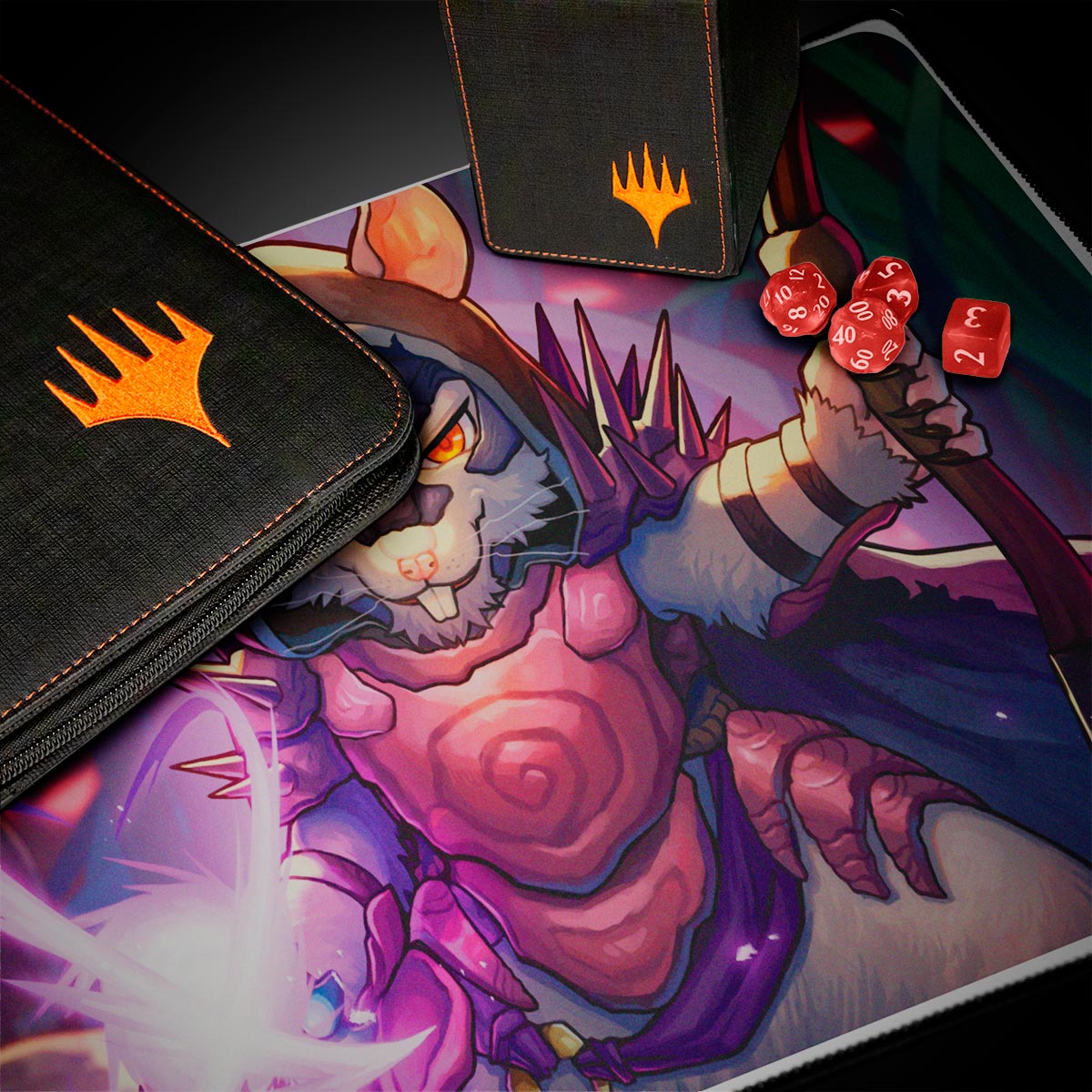 A black Magic: The Gathering deck box and binder with orange Magic: The Gathering logos, alongside red dice and a Bloomburrow Vren, the Relentless playmat.