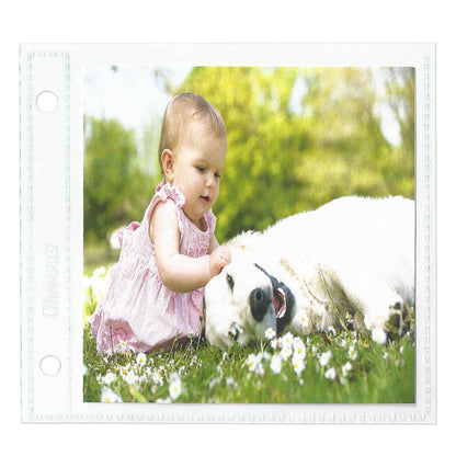 A white Ultra-Pro 2-Hole Assorted Photo Pages (20ct) for 2" x 2" & 4" x 4" Prints.