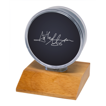 A Hockey Puck Light Wood Base Display Holder. Brand: nan, Item: Hockey Puck Light Wood Base Display Holder.
