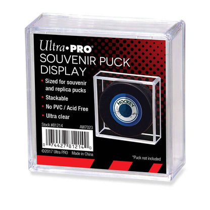 A clear plastic hockey puck souvenir display holder. Brand: Ultra PRO, Item: Souvenir Puck Display.