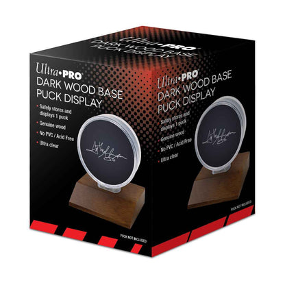 A Dark Wood Hockey Puck Display Holder. Brand: Ultra Pro, Item: Dark Wood Base Puck Display.