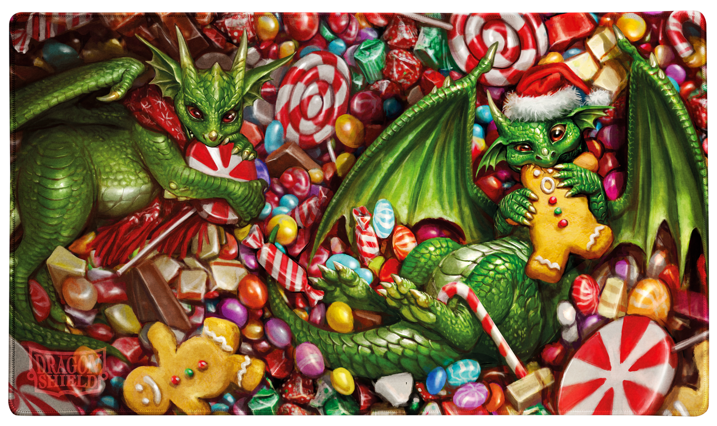A green dragon surrounded by Christmas candy and gingerbread cookies. Brand: Dragon Shield (Dev), Item: Christmas 2024 - TCG Playmat