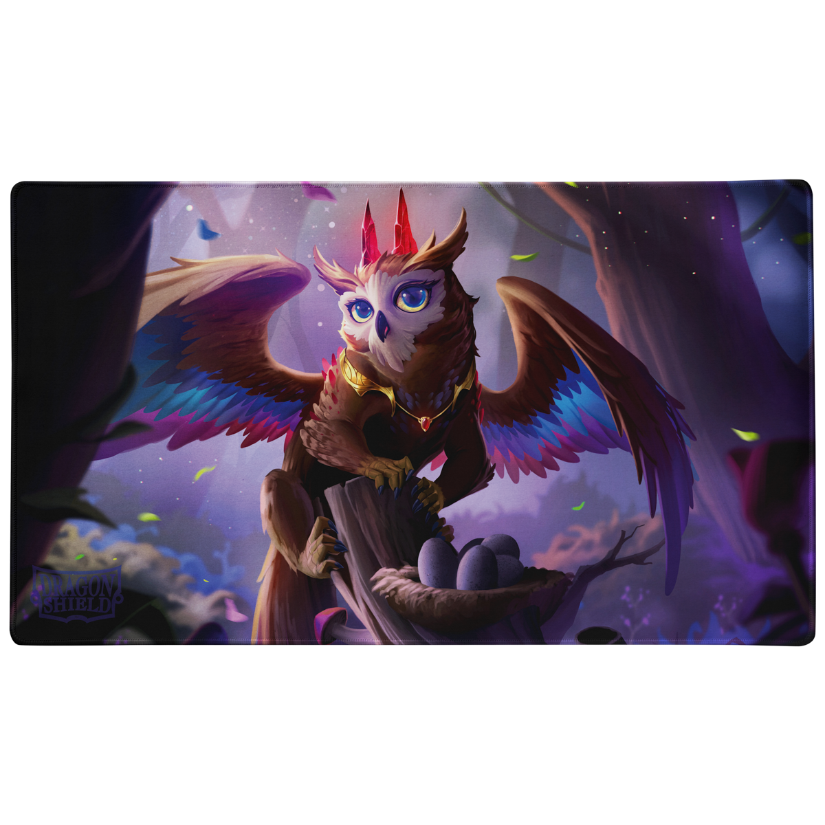 A fantasy art TCG Playmat featuring a Dragowlis creature with owl and dragon features, sitting on a branch next to a nest of eggs. Brand: Dragon Shield (Dev), Item: The Dragowlis - TCG Playmat.