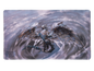 A gray and blue winged dragon TCG playmat. Brand: Dragon Shield, Item: Eden - TCG Playmat.