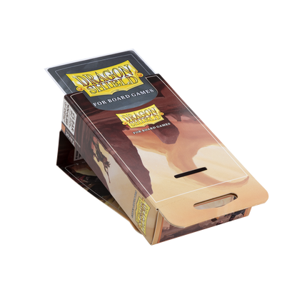 A clear Dragon Shield board game sleeve box. Brand: Dragon Shield, Item: Tarot - Clear/Non-Glare - Board Game Sleeves.