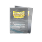 A clear/non-glare Dragon Shield board game sleeve. Brand: Dragon Shield, Item: Grand Standard Sleeves.