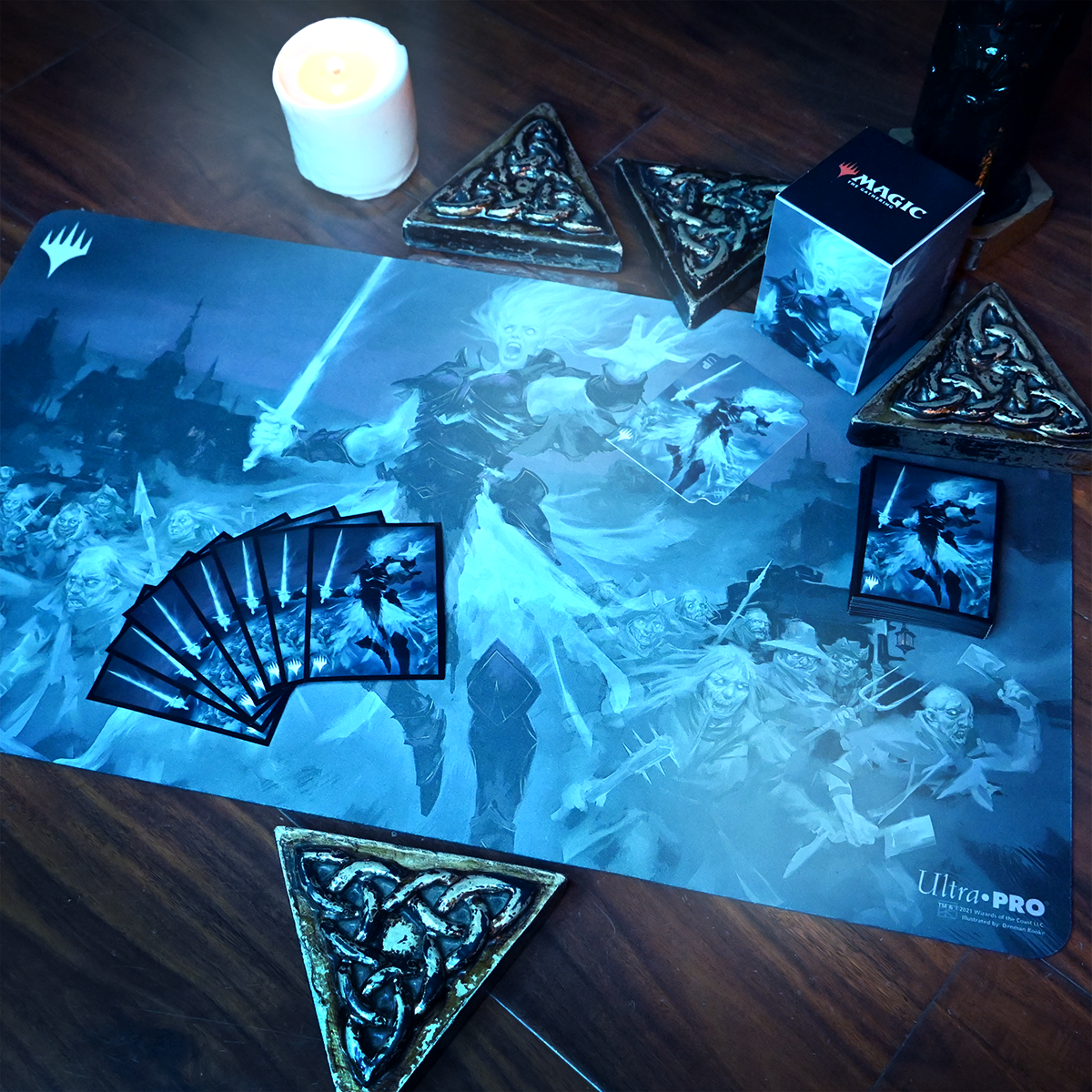 A blue Magic: The Gathering playmat featuring Millicent, Restless Revenant and a fan of cards. Brand: Ultra-Pro, Item: Innistrad: Crimson Vow Millicent, Restless Revenant Commander Combo Box.