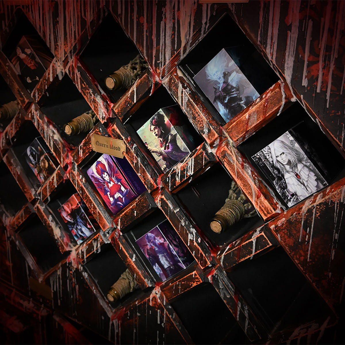 A wooden display rack with various Magic: The Gathering cards and other collectibles, some with a gothic or horror theme, displayed in diamond-shaped compartments.