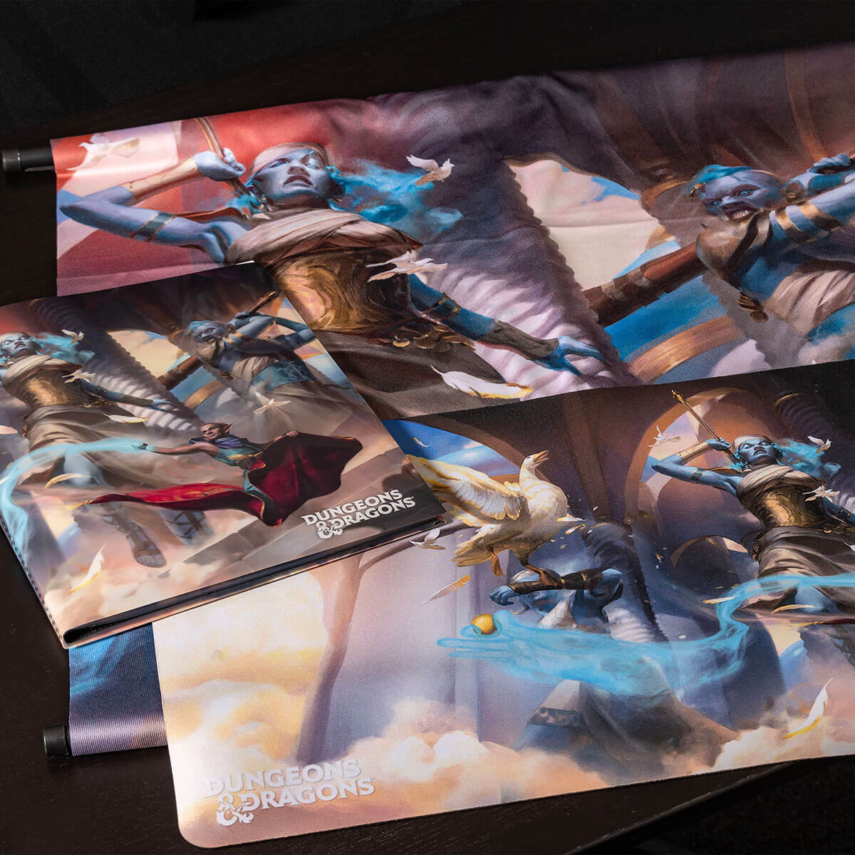 A Dungeons & Dragons Cover Series Bigby Presents: Glory of the Giants Standard Gaming Playmat featuring blue-skinned figures and white birds.