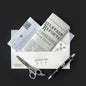 A sealed Family Secrets Series: Episode 10 - Revelations Escape Mail box featuring a letter, newspaper, scissors, and pen.
