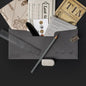 A sealed Family Secrets Series: Episode 6 - Quiet As the Grave Escape Mail package with a feather, pencil, and ruler.