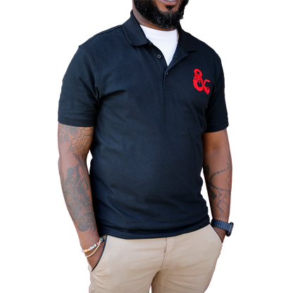 A Black Dungeons & Dragons Embroidered Polo Shirt with Red D&D Logo. Brand: Legion Supplies, Item: Dungeons & Dragons Embroidered Polo Shirt - Black with Red D&D Logo.