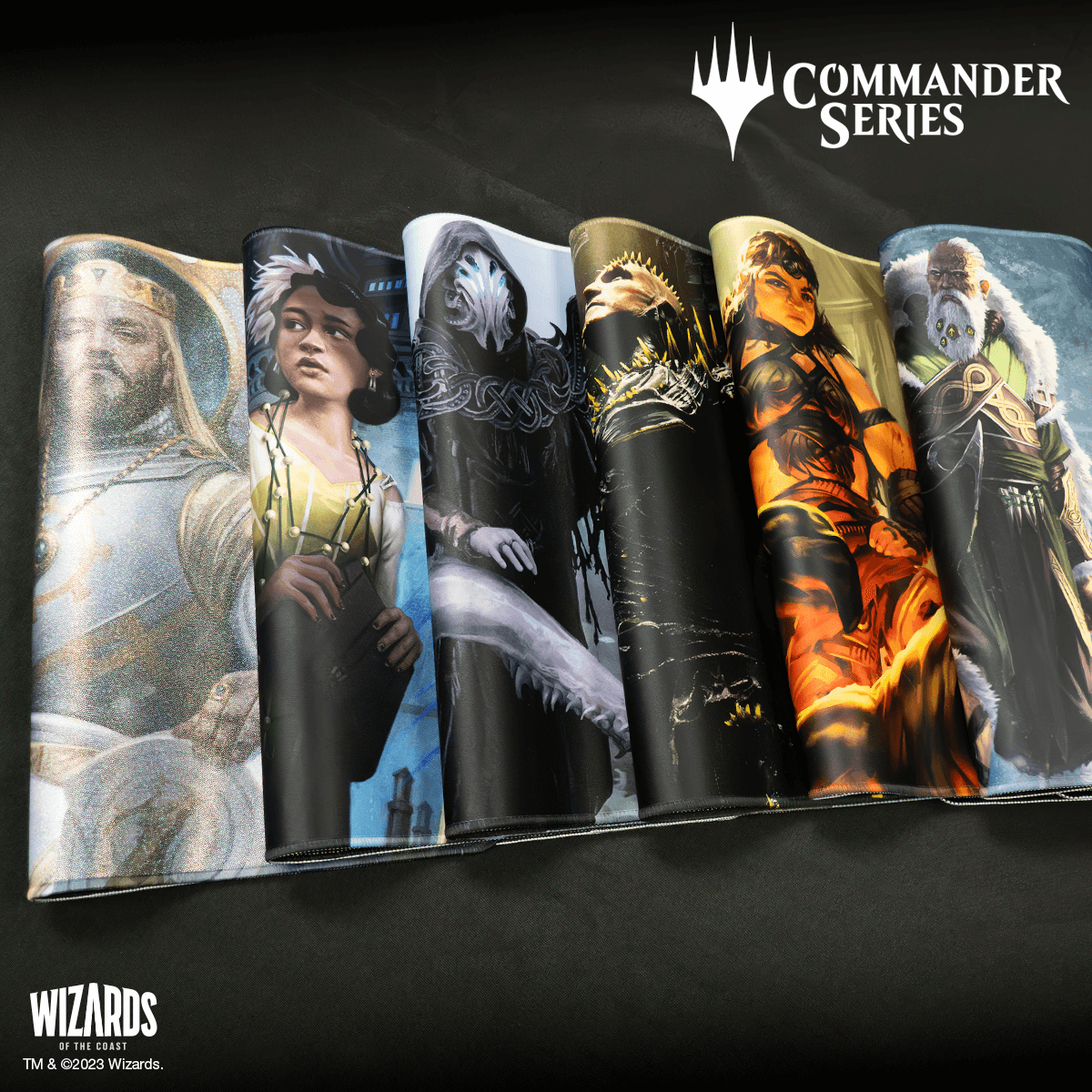 A collection of Magic: The Gathering Commander Series playmats featuring artwork from the game. Brand: Wizards of the Coast, Item: Commander Series Playmats