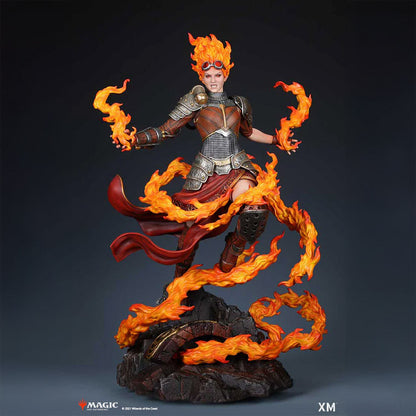 A detailed statue of Chandra Nalaar from Magic: The Gathering, engulfed in flames. Brand: XM Studios, Item: Chandra Nalaar 1:4 Scale Collectible Statue.