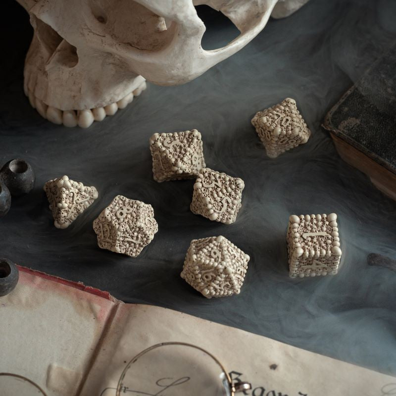 Q-Workshop Dice Macabre Set – beige resin with brown wash RPG dice – Flip Tap Win TCG, Saline MI