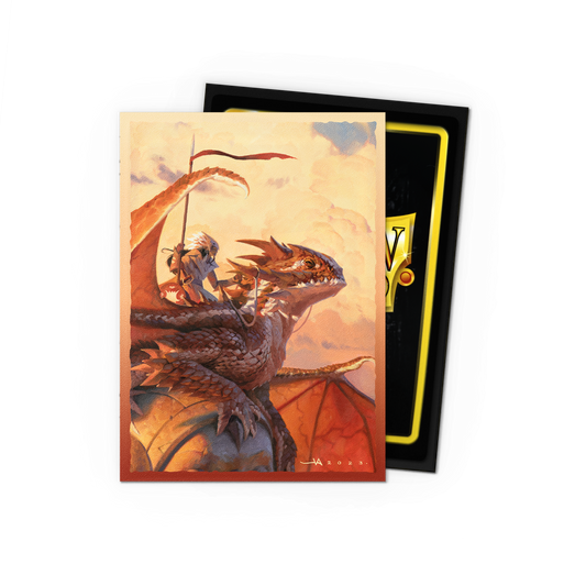 A matte dual art card sleeve featuring a dragon and rider, with a signature and year "JA 2023".